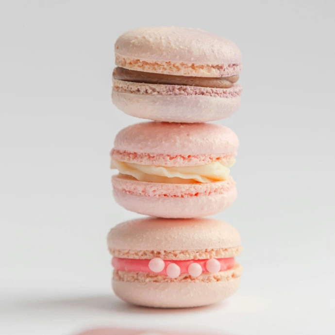 a stack of three macaroons sitting on top of each other